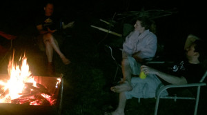 New and old töads socializing over beers and a campfire.
